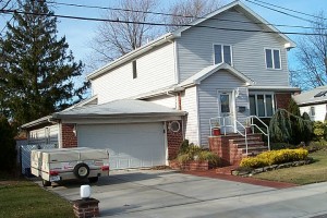 Our  Oceanside Home with our Pop-up Camper in the Driveway